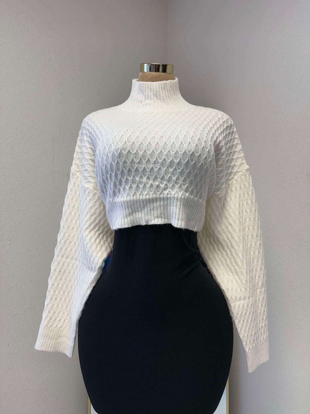 Sam’s backless sweaters